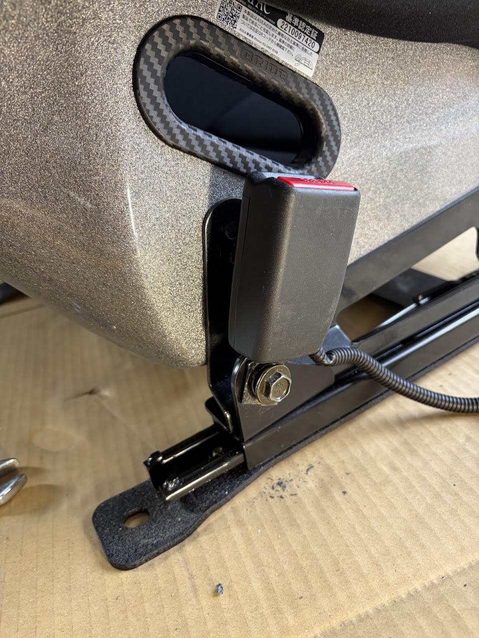 seat belt buckle modified to pci rail